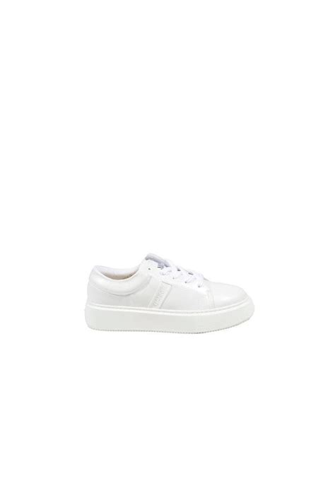 ganni white sneakers.